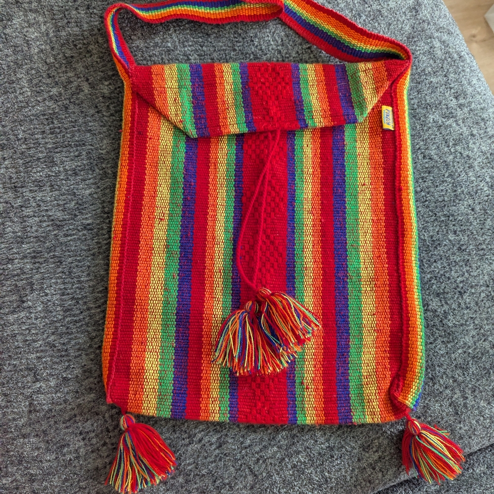 Vibrant Red and Orange Striped Shoulder Bag with Tassels